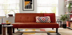 Rust fabric sofa bed with compact 2 seater design