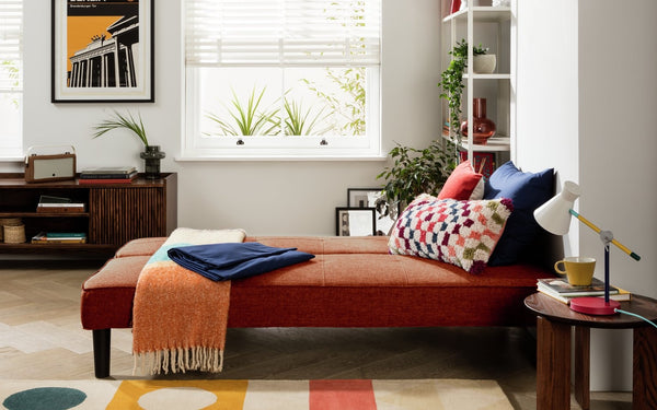 Patsy 2 seater clic clac sofa bed with wooden and plastic feet
