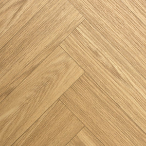 Modern oak dining table with chevron tabletop design