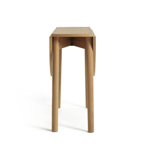 Space saving 4 seater folding dining table with oak effect tabletop