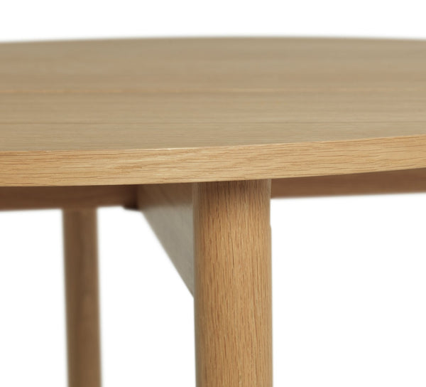 Habitat Jessie round dining table showing solid wood legs
